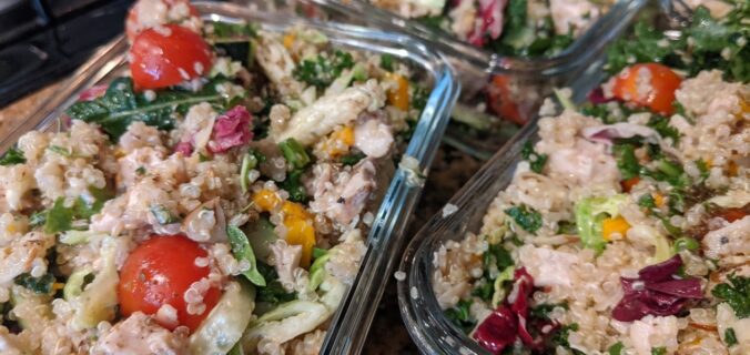 Greek chicken quinoa salad in mealprep containers