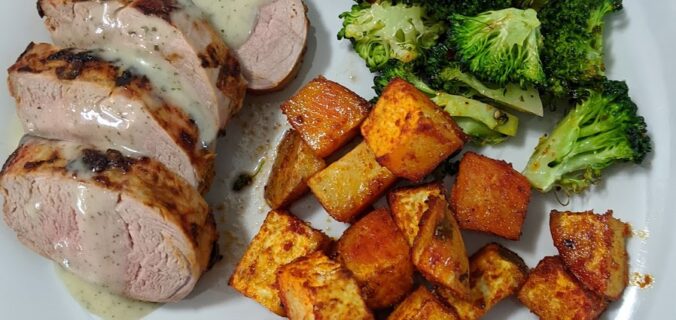 Mexican spiced pork loin with crema, sweet potatoes, broccoli